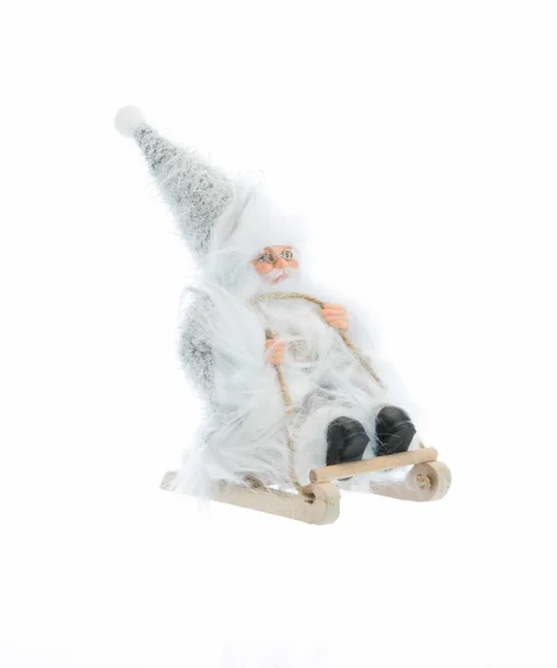 Père Noël en tissu gris et blanc sur luge avec hotte - 18 cm