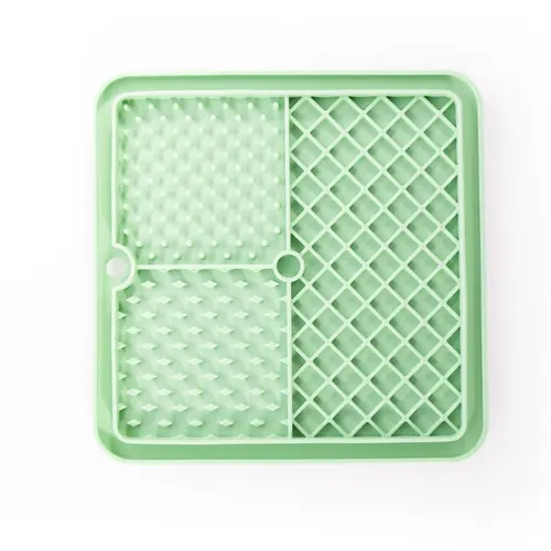 Tapis à lécher pour chien en silicone coloris vert trio Martin Sellier - 20 cm