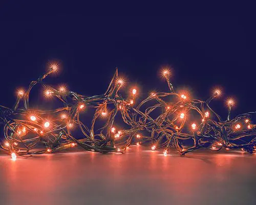 Guirlande lumineuse animée à 128 LED cuivre sur câble vert Flicker Light® - 8 m